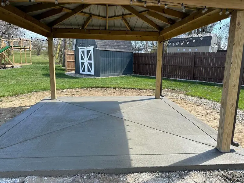 Forms and gravel base prepared for a concrete slab under a gazebo